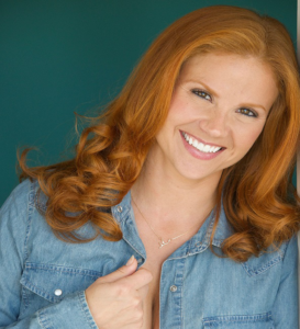 Photo of redhead female in jean shirt